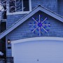 Alpine Corporation Large Snowflake Decoration with Blue and White Motion LED Lights