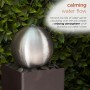 SELF-CONTAINED METAL ORB FOUNTAIN WITH RIVER STONES 