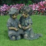 BOY AND GIRL READING TOGETHER STATUE