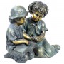 BOY AND GIRL READING TOGETHER STATUE