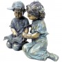 BOY AND GIRL READING TOGETHER STATUE