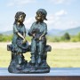 16" TALL GIRL AND BOY SITTING ON BENCH WITH PUPPY STATUE