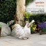 White and Gray Rooster Statue