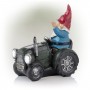 Alpine Corporation 10" Tall Outdoor Garden Gnome Riding Green Tractor Yard Statue Decoration with LED Lights, Multicolor