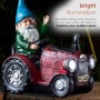 Alpine Corporation 10" Tall Outdoor Garden Gnome Riding Red Tractor Yard Statue Decoration with LED Lights, Multicolor